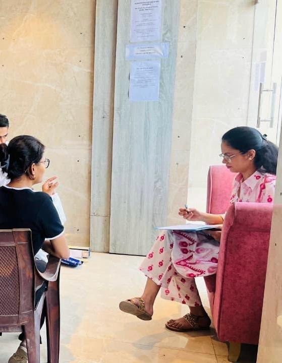 Dr. Ria Thukral Peetla in conversation with a patient
